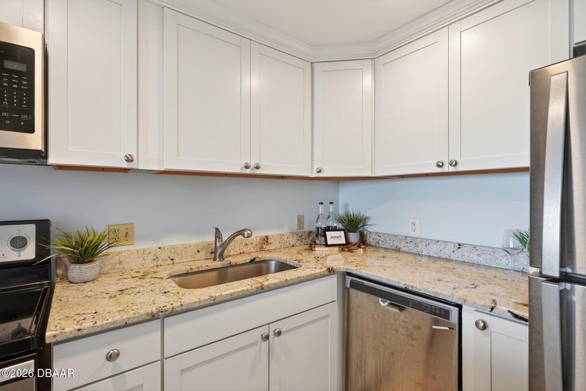 Welcome to coastal living at its finest in the highly desirable - photo 12