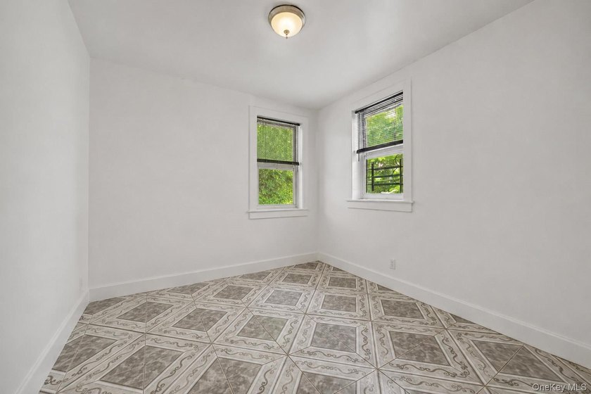 Welcome to this well-configured two-family home in the heart of - photo 15