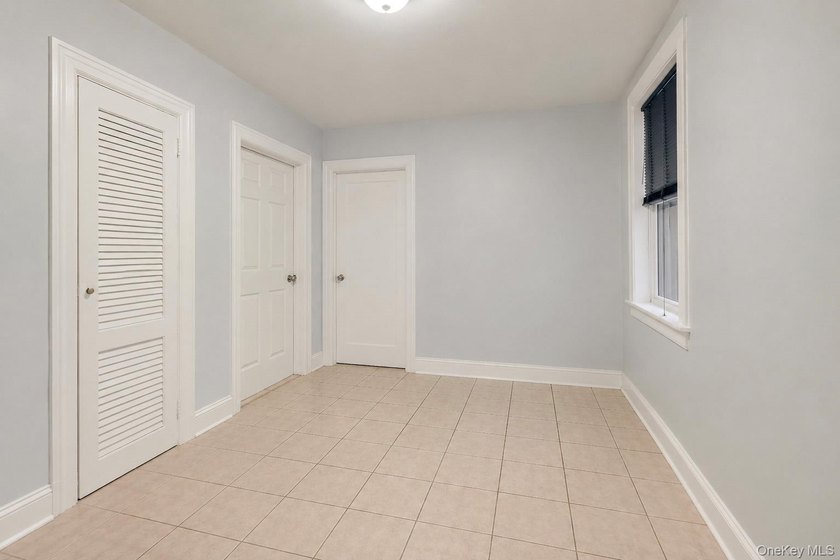 Welcome to this well-configured two-family home in the heart of - photo 16