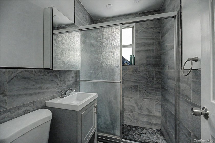 Welcome to this well-configured two-family home in the heart of - photo 23