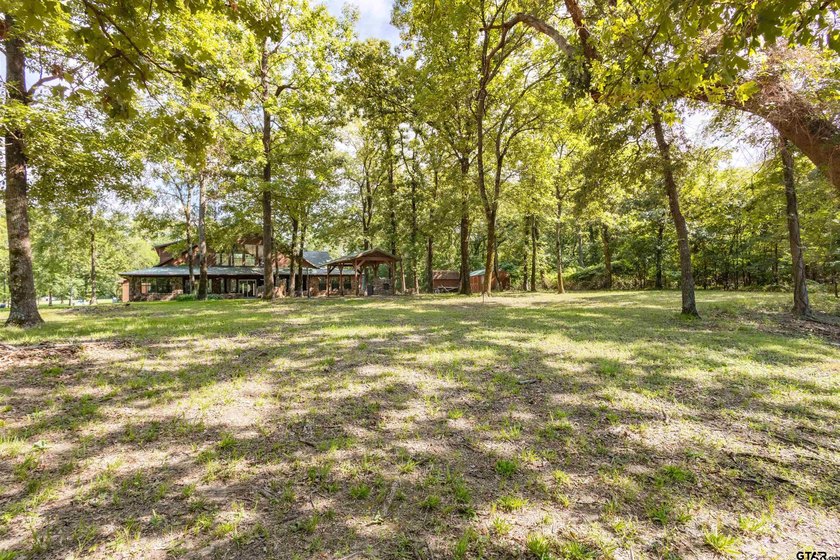 Experience the perfect blend of privacy, comfort, and East Texas - photo 38