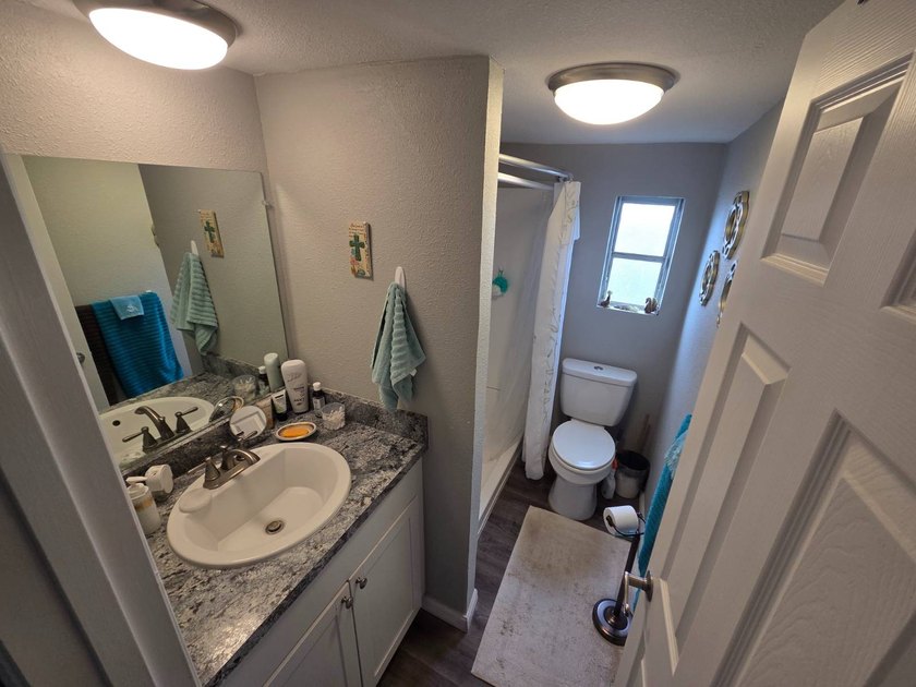 Please Note: This home is located on leased land and does not - photo 12