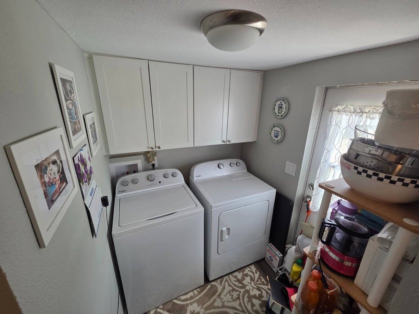 Please Note: This home is located on leased land and does not - photo 22