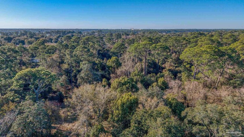 Prime development opportunity on 0.64 acres featuring four - photo 8
