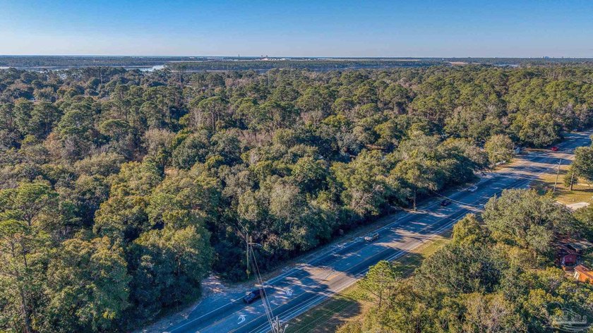 Prime development opportunity on 0.64 acres featuring four - photo 10