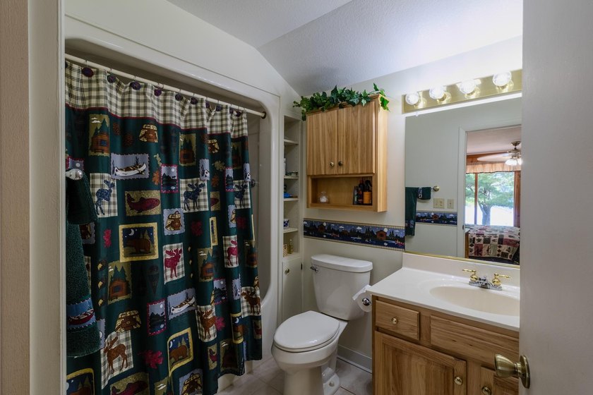Neat, tidy, and designed for easy main-level living, this - photo 22