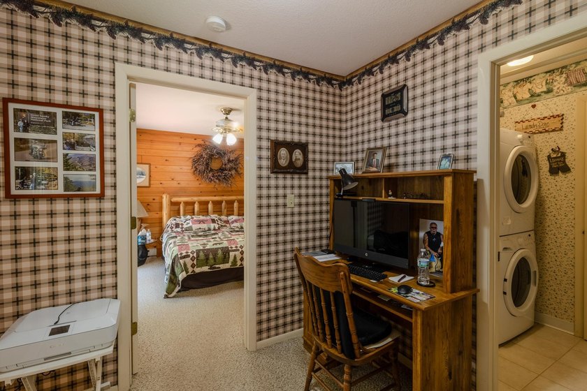 Neat, tidy, and designed for easy main-level living, this - photo 23