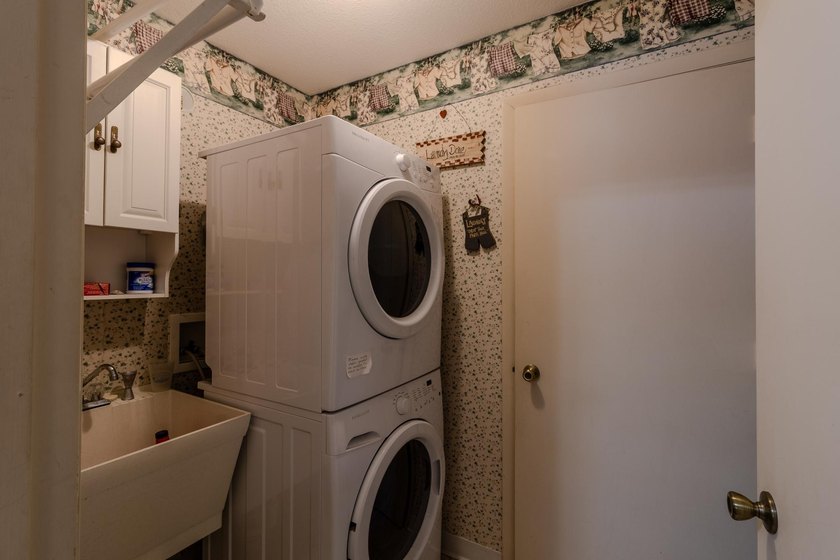 Neat, tidy, and designed for easy main-level living, this - photo 24