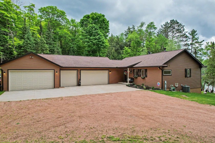 Tucked away in Watersmeet, MI, just north of the border, you'll - photo 39