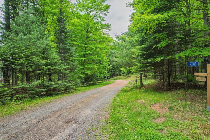 Tucked away in Watersmeet, MI, just north of the border, you'll - photo 41