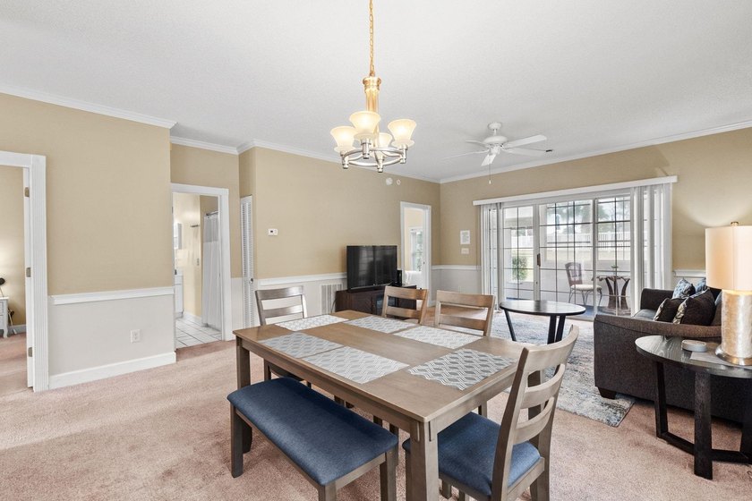 Welcome to 687 Riverwalk Dr, Unit 104, a coastal condo located - photo 11