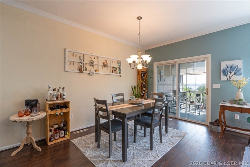 Walk-in, no steps, attached garage, lake views, and very low - photo 13