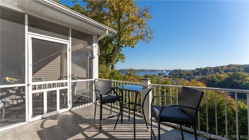 Walk-in, no steps, attached garage, lake views, and very low - photo 15