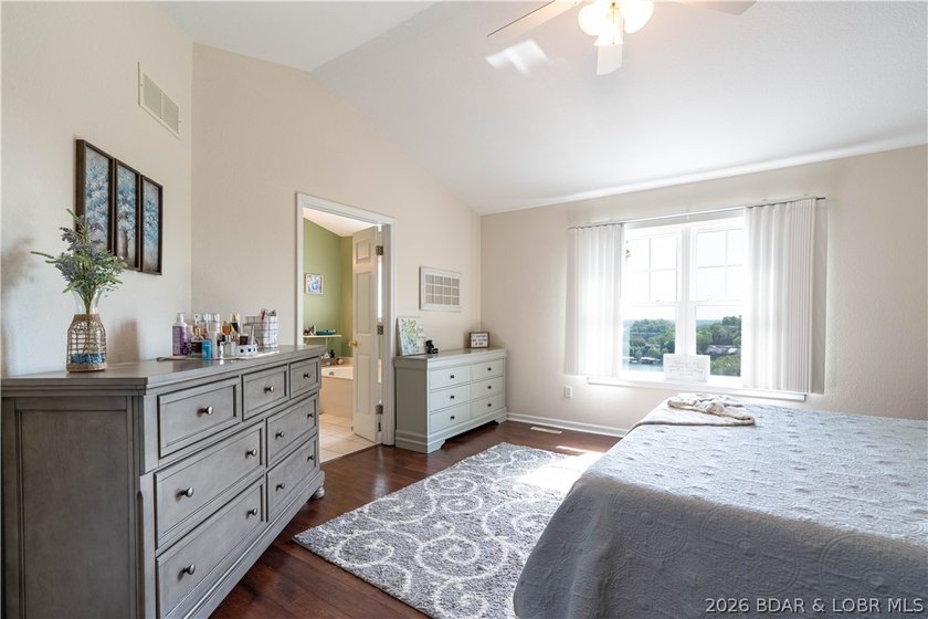 Walk-in, no steps, attached garage, lake views, and very low - photo 20