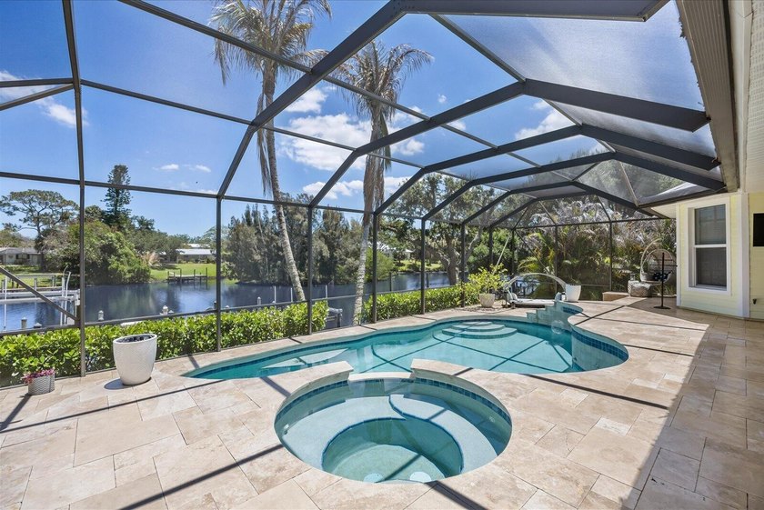 Beautiful custom-built waterfront home with private pool on wide - photo 22