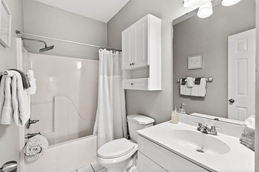 Welcome to 687 Riverwalk Dr, Unit 104, a coastal condo located - photo 24