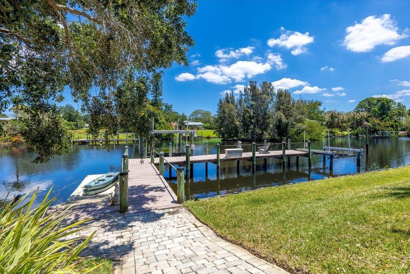 Beautiful custom-built waterfront home with private pool on wide - photo 26