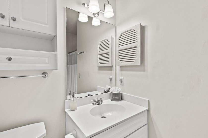 Welcome to 687 Riverwalk Dr, Unit 104, a coastal condo located - photo 27