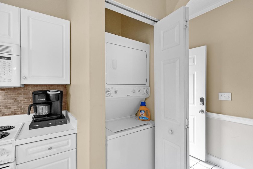 Welcome to 687 Riverwalk Dr, Unit 104, a coastal condo located - photo 29