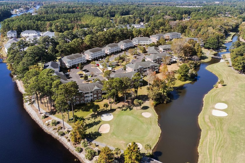 Welcome to 687 Riverwalk Dr, Unit 104, a coastal condo located - photo 32