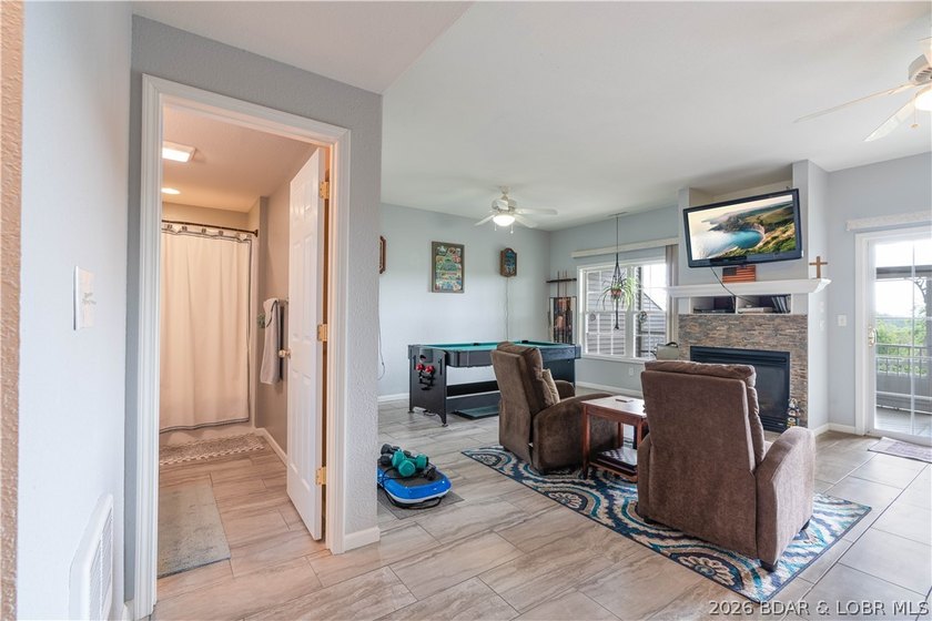 Walk-in, no steps, attached garage, lake views, and very low - photo 38