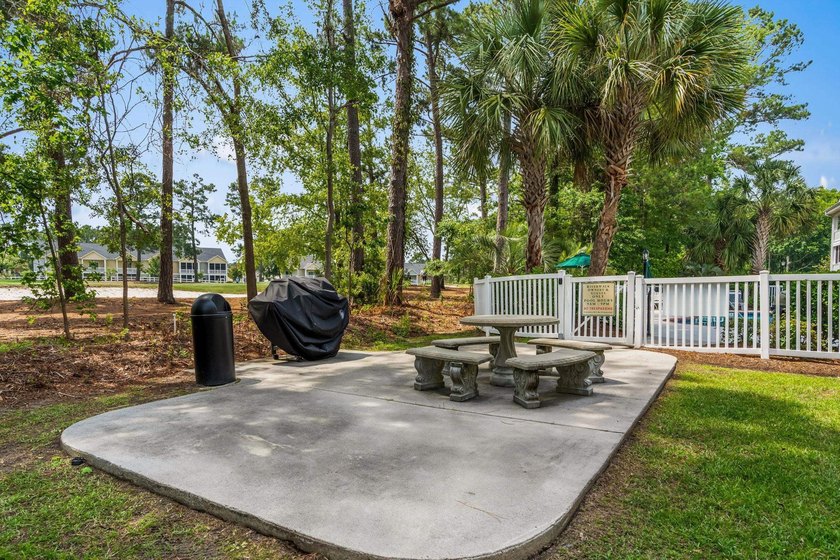 Welcome to 687 Riverwalk Dr, Unit 104, a coastal condo located - photo 44
