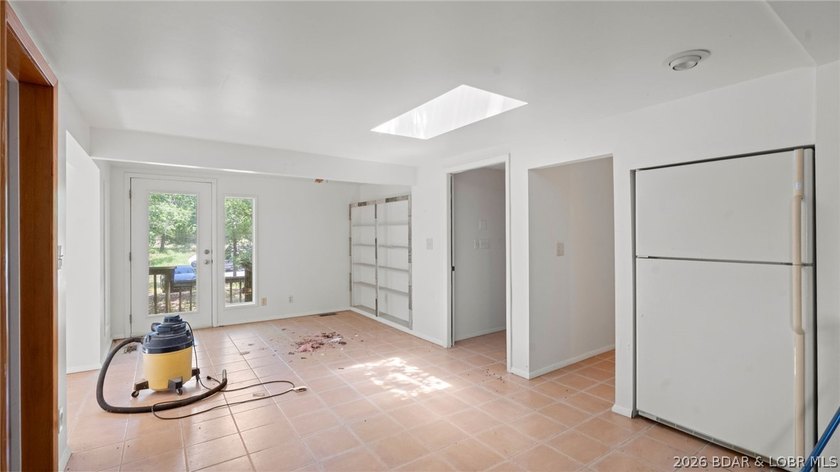 Fix-and-Flip Opportunity with Incredible Lakefront Views This - photo 22