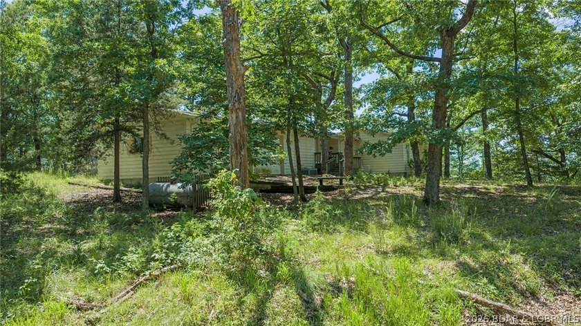 Fix-and-Flip Opportunity with Incredible Lakefront Views This - photo 34