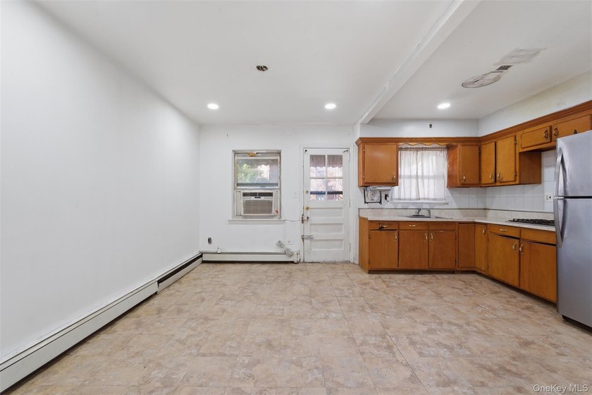Welcome to 2925 Wallace Ave, a legal 2-family home full of - photo 10