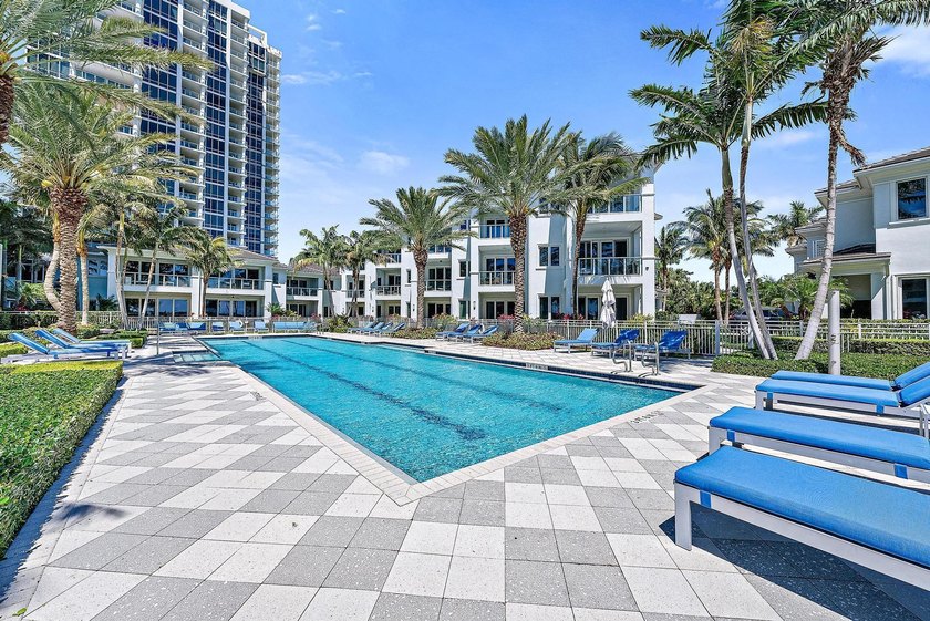 An elevated expression of coastal living, this three-story Water - photo 55