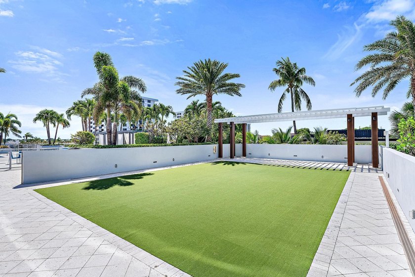 An elevated expression of coastal living, this three-story Water - photo 57
