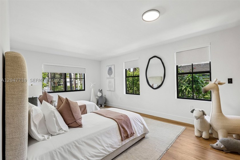 Walk to the beach from this stunning designer-renovated Miami - photo 22