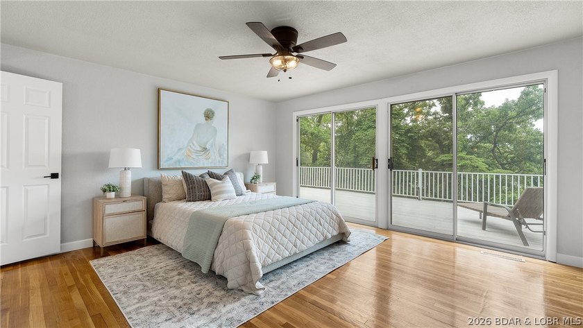 Lakefront living at its finest! This updated 4-bedroom, 3-bath - photo 14