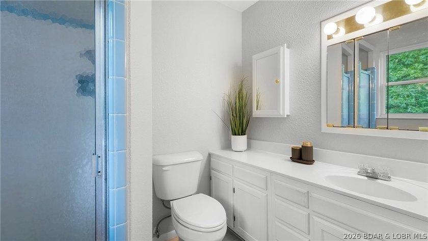 Lakefront living at its finest! This updated 4-bedroom, 3-bath - photo 17