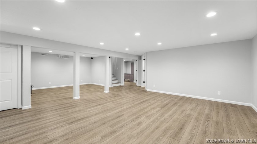 Lakefront living at its finest! This updated 4-bedroom, 3-bath - photo 24