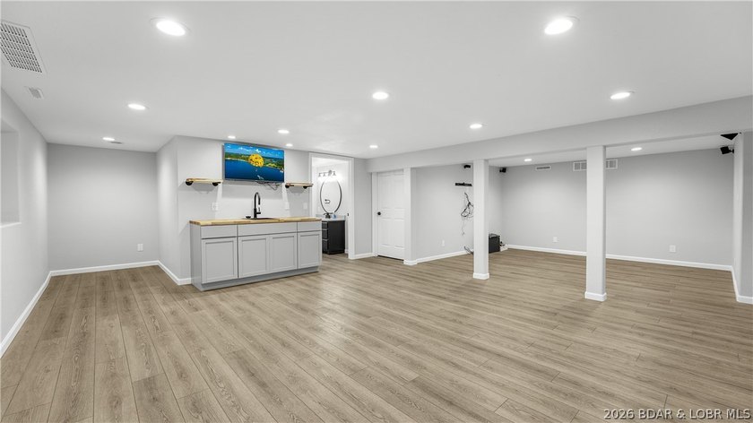 Lakefront living at its finest! This updated 4-bedroom, 3-bath - photo 27