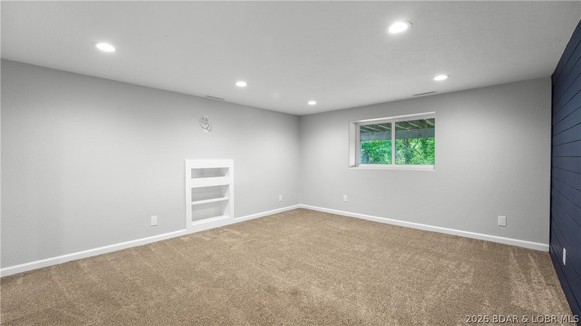 Lakefront living at its finest! This updated 4-bedroom, 3-bath - photo 28