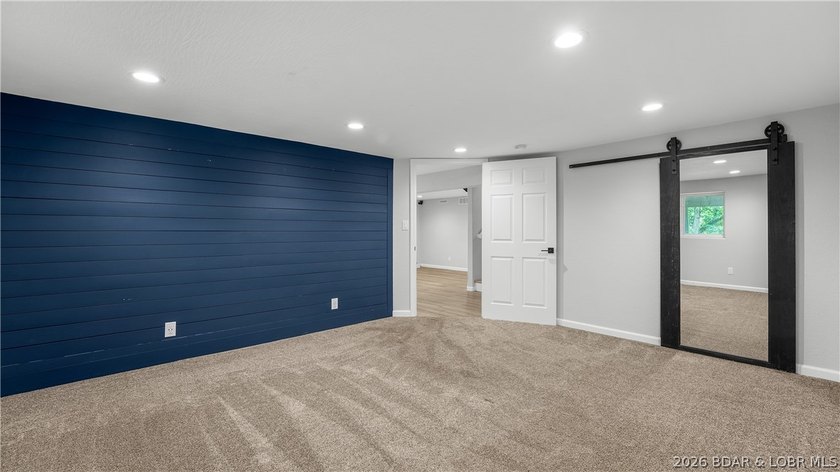 Lakefront living at its finest! This updated 4-bedroom, 3-bath - photo 29