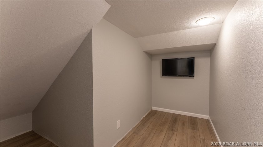 Lakefront living at its finest! This updated 4-bedroom, 3-bath - photo 32