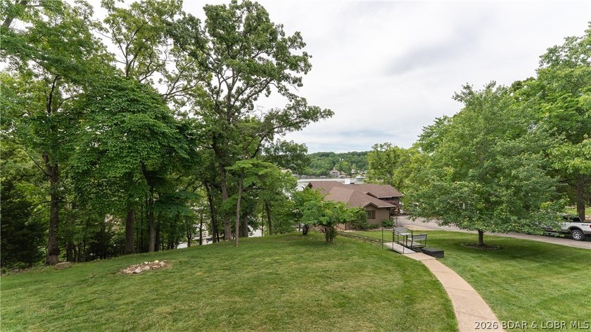 Lakefront living at its finest! This updated 4-bedroom, 3-bath - photo 38