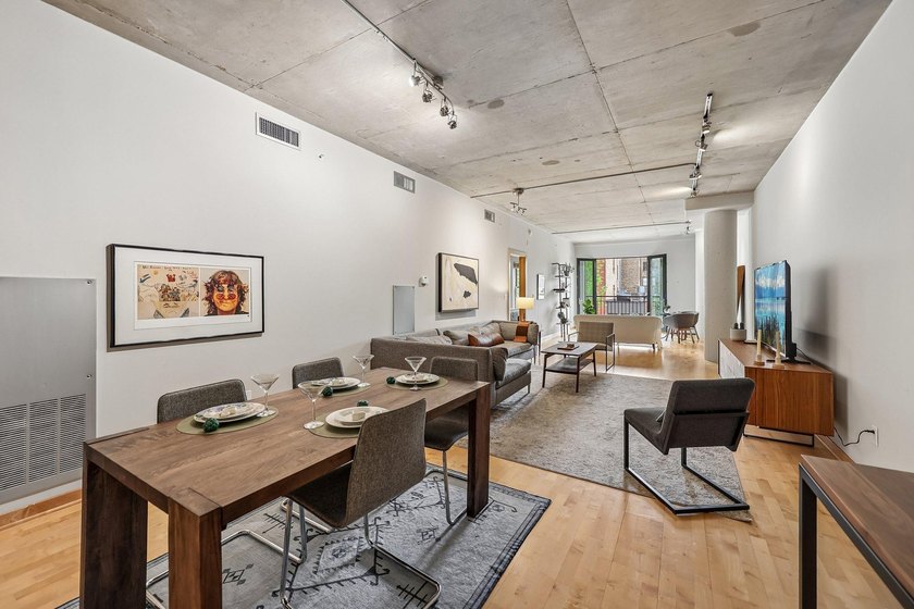 Welcome to 212 Lofts, where city living feels open, bright, and - photo 7