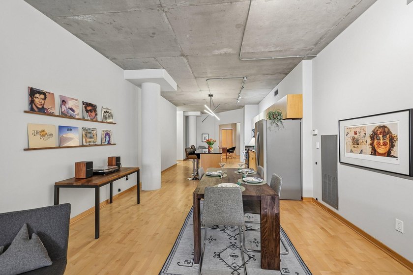 Welcome to 212 Lofts, where city living feels open, bright, and - photo 8