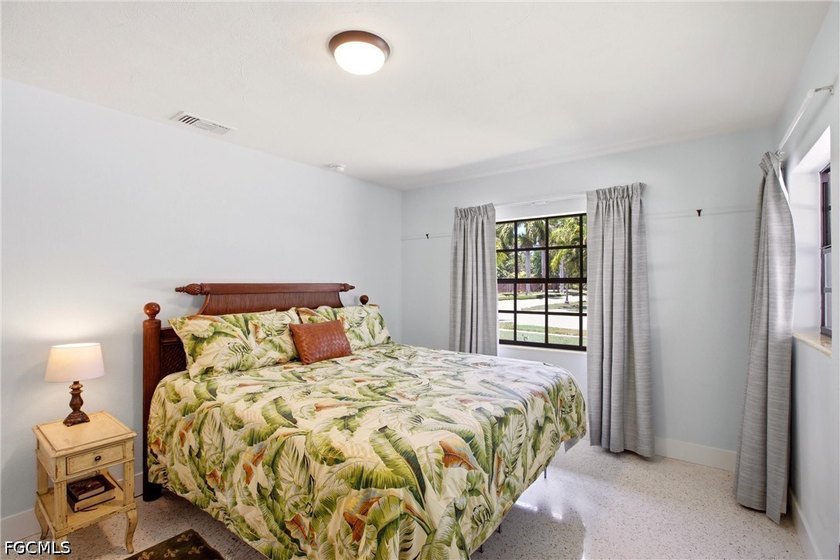 This 3-bedroom, 2-bathroom ranch-style home is set on an - photo 15