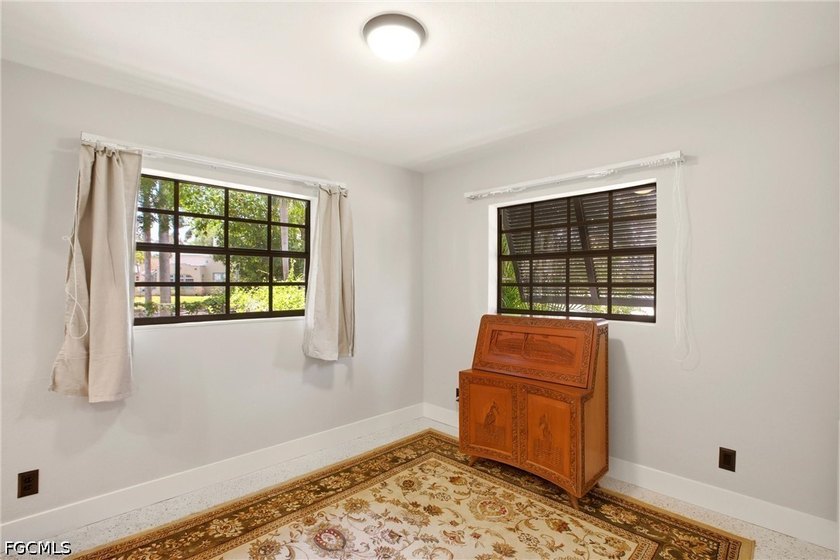 This 3-bedroom, 2-bathroom ranch-style home is set on an - photo 18