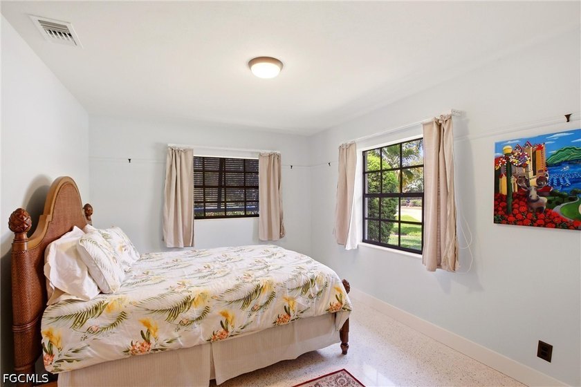 This 3-bedroom, 2-bathroom ranch-style home is set on an - photo 21