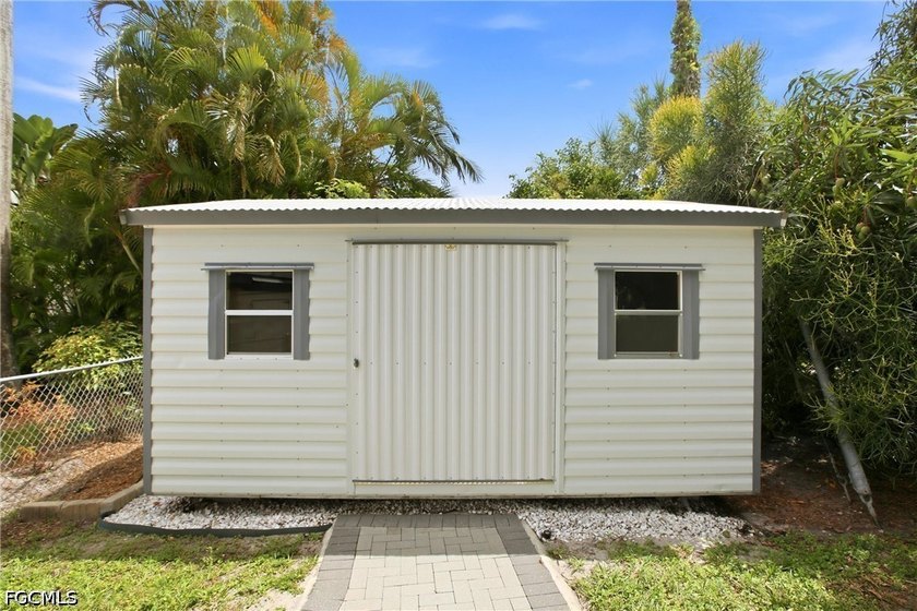 This 3-bedroom, 2-bathroom ranch-style home is set on an - photo 24