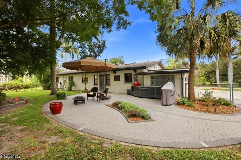 This 3-bedroom, 2-bathroom ranch-style home is set on an - photo 28