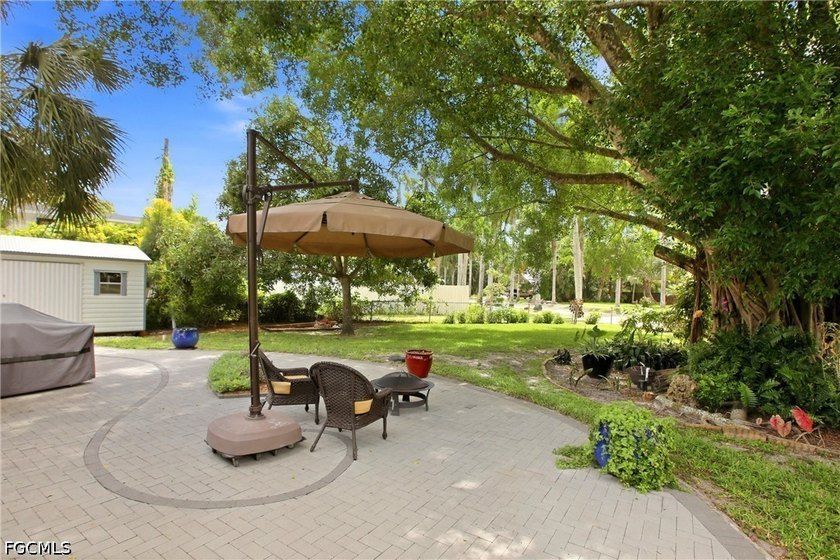 This 3-bedroom, 2-bathroom ranch-style home is set on an - photo 30