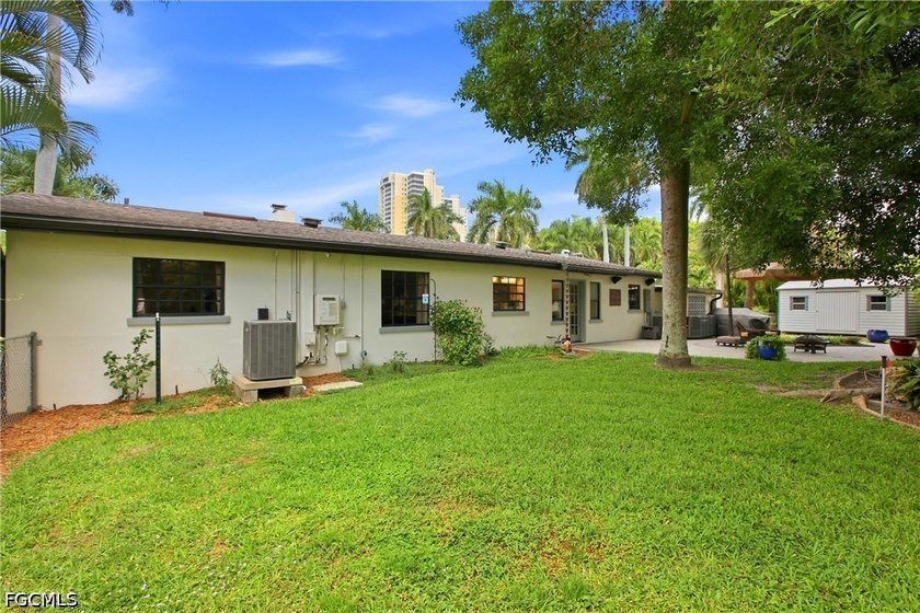 This 3-bedroom, 2-bathroom ranch-style home is set on an - photo 32