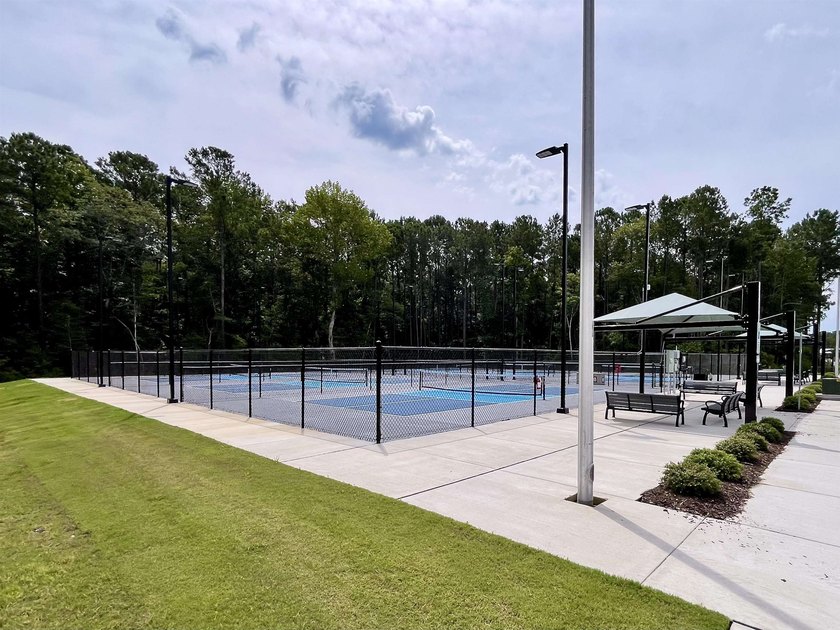 Spacious homesite located in the Waterbrook Woods section of - photo 15